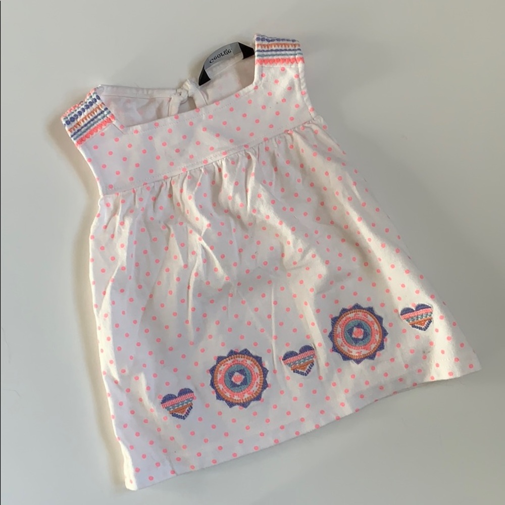 Tank with pink dots